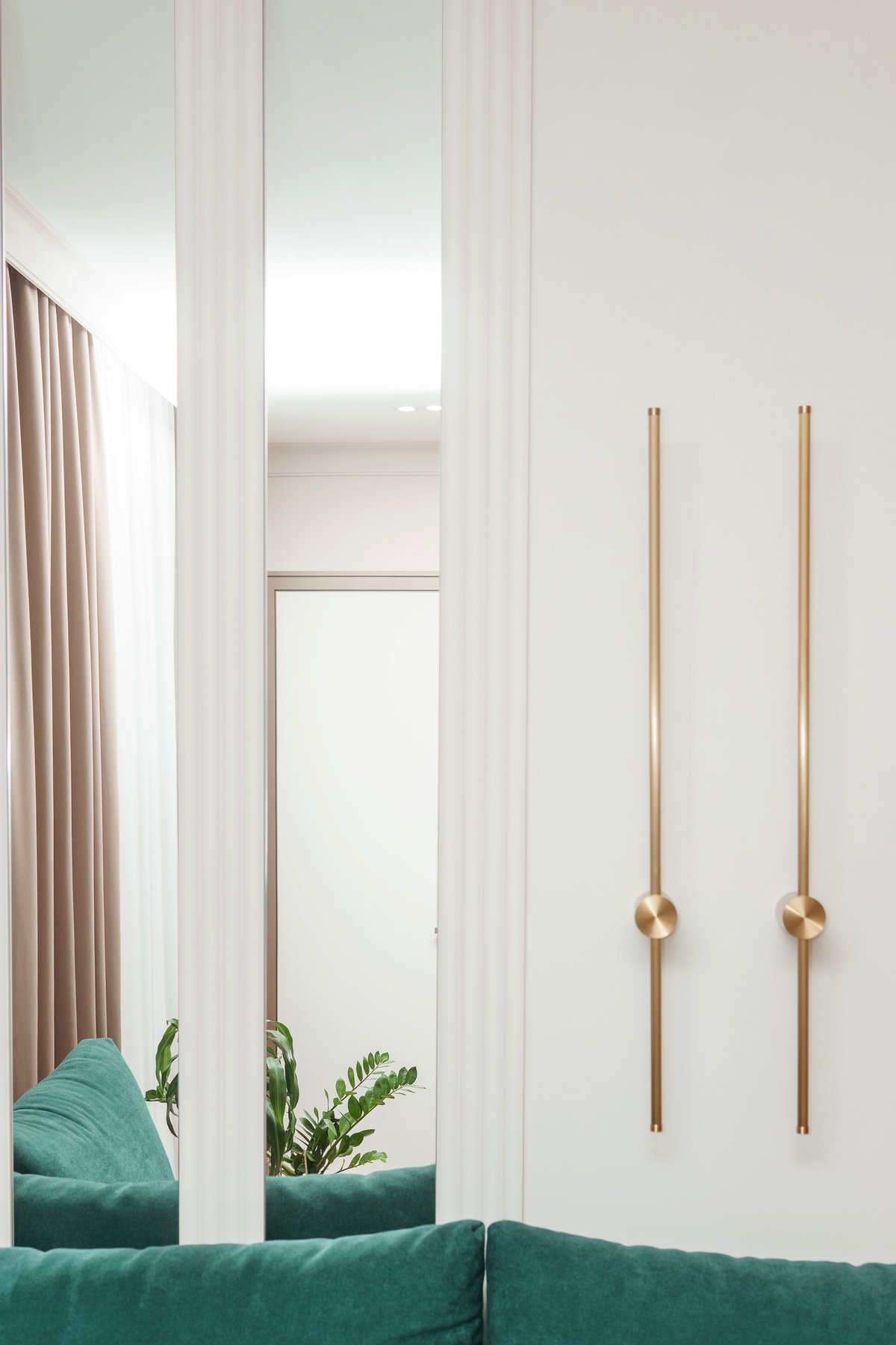 Contemporary interior detail with gold handles and soft natural light